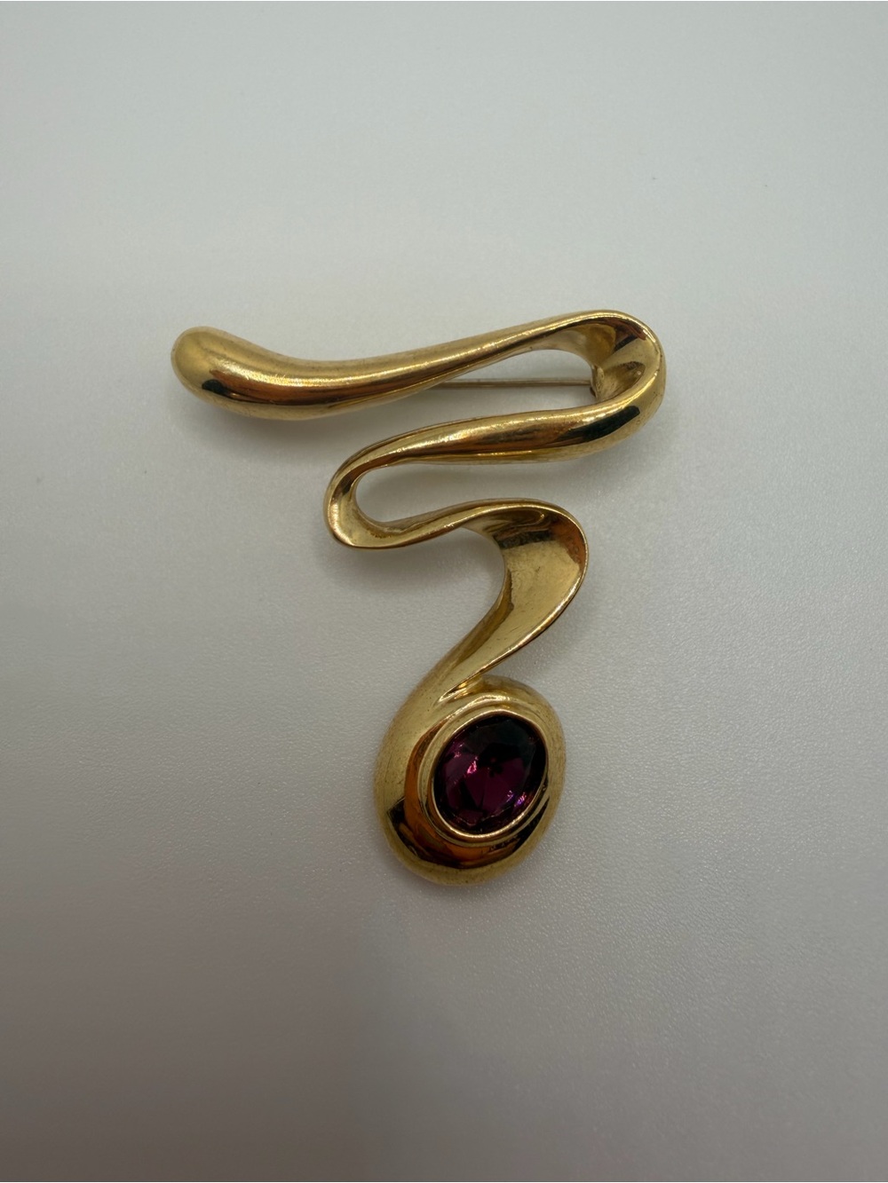 Butler Gold-Tone Swirl Pendant with Deep Pink Stone